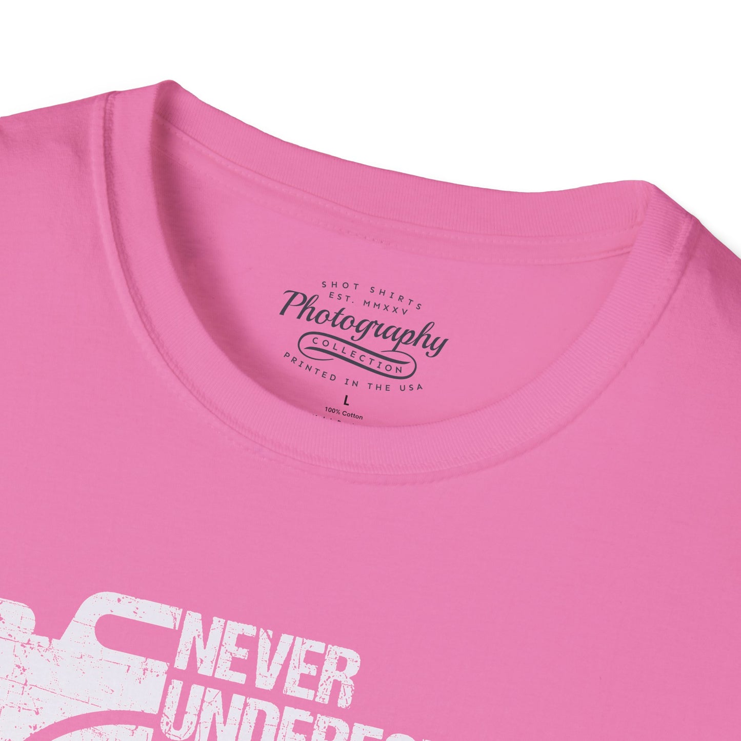 Close-up of a pink t-shirt with text and graphics on a white background