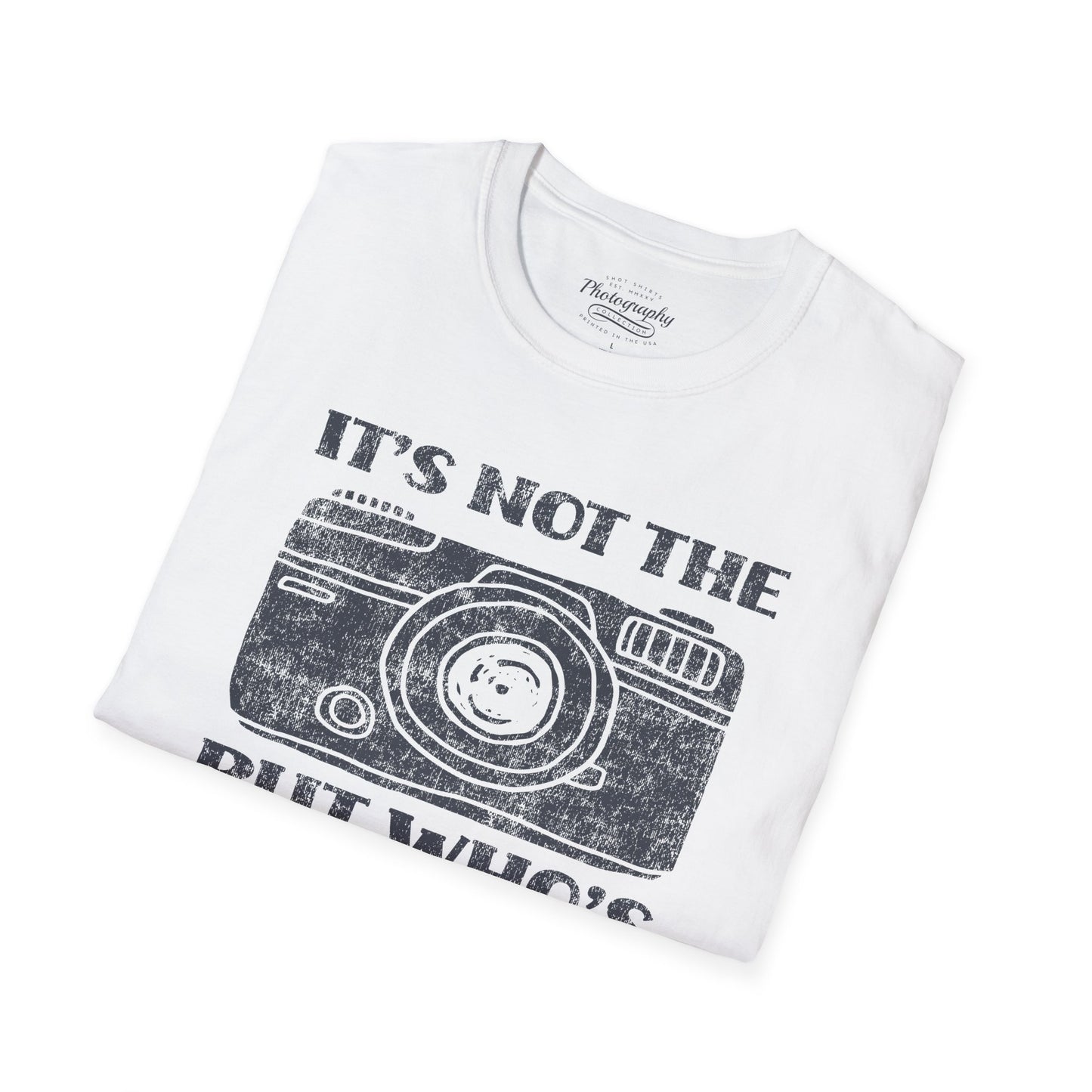 White t-shirt with black camera graphic and text on a white background