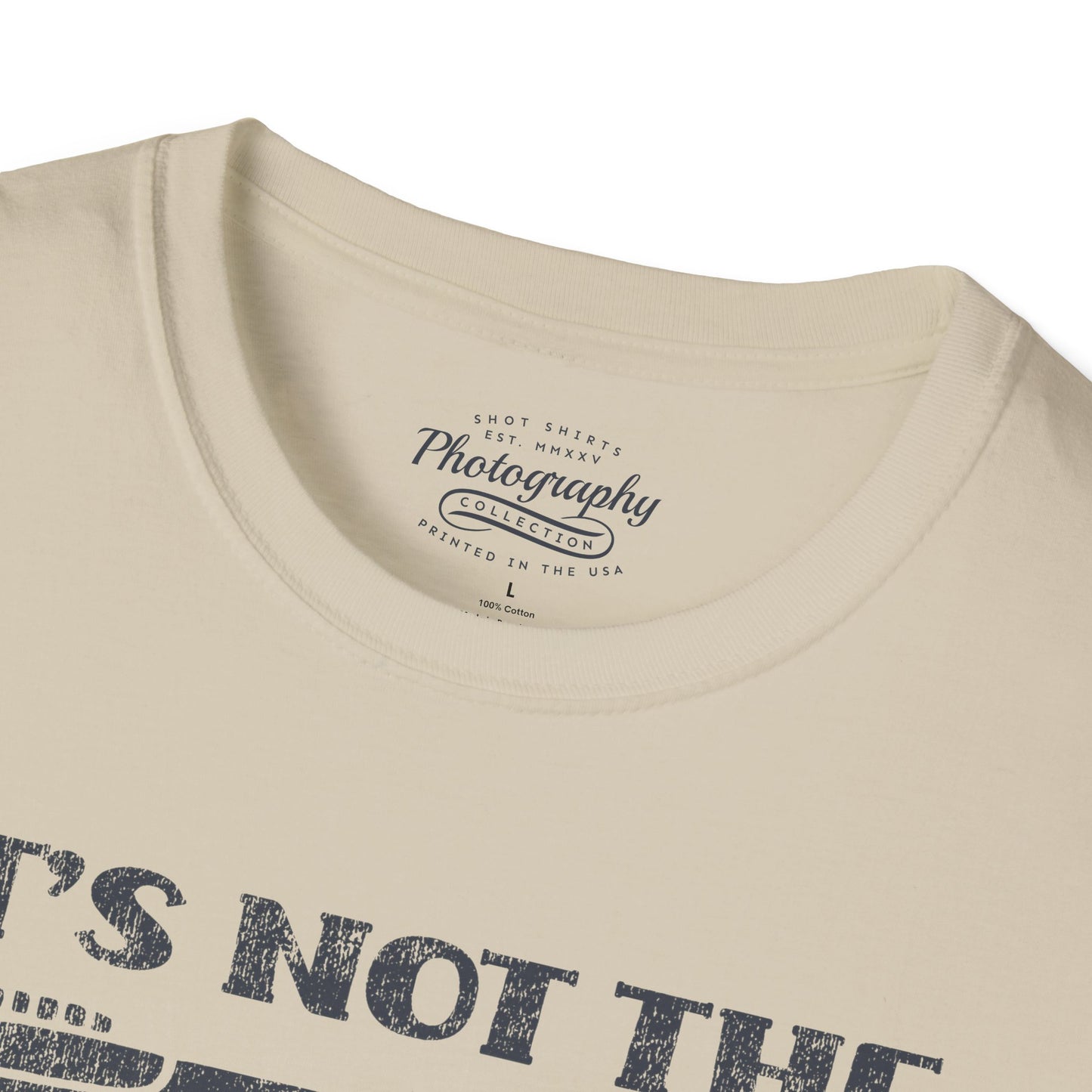 Beige t-shirt with text and branding on a white background