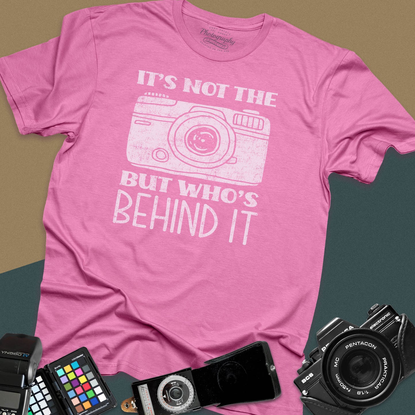 Distressed azalea t-shirt featuring a vintage rangefinder camera illustration with a bold retro typography quote for professional visual creators.