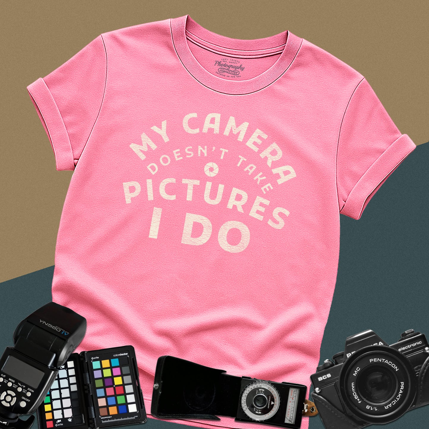 Minimalist azalea t-shirt featuring the arched vintage text "My Camera Doesn't Take Pictures I Do" with an aperture icon for photographers.