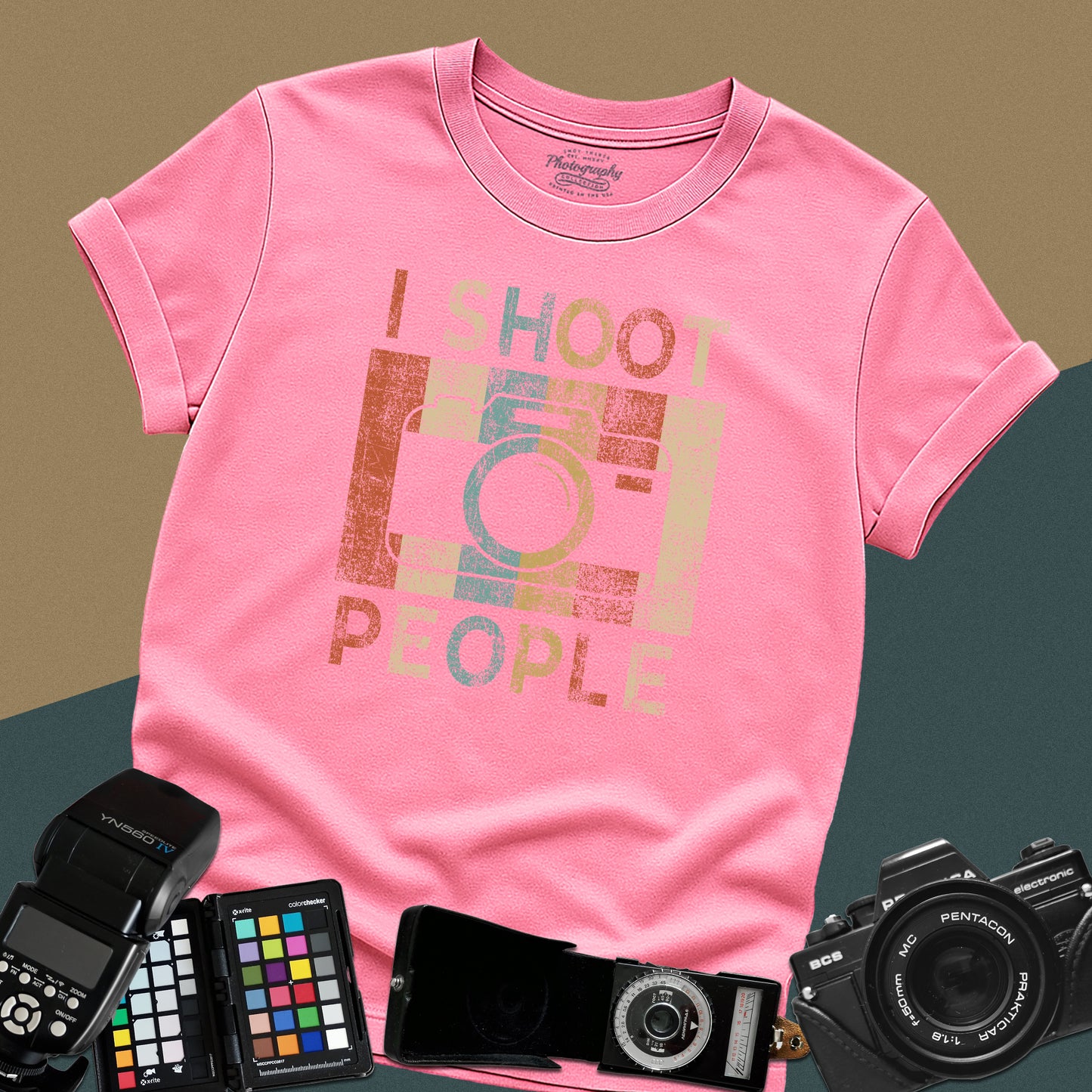 Azalea t-shirt with 'I SHOOT PEOPLE' text and camera-themed design, surrounded by photography equipment on a gradient background.