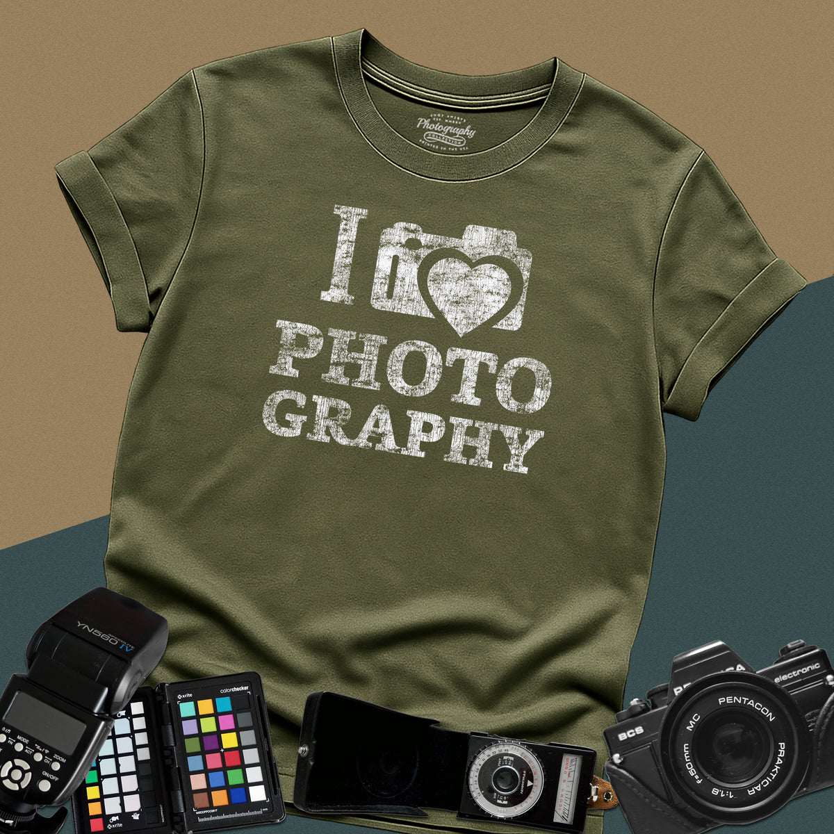 Heavy distressed military-green t-shirt featuring a retro camera icon with an integrated heart silhouette and bold split typography text "I Love Photography".