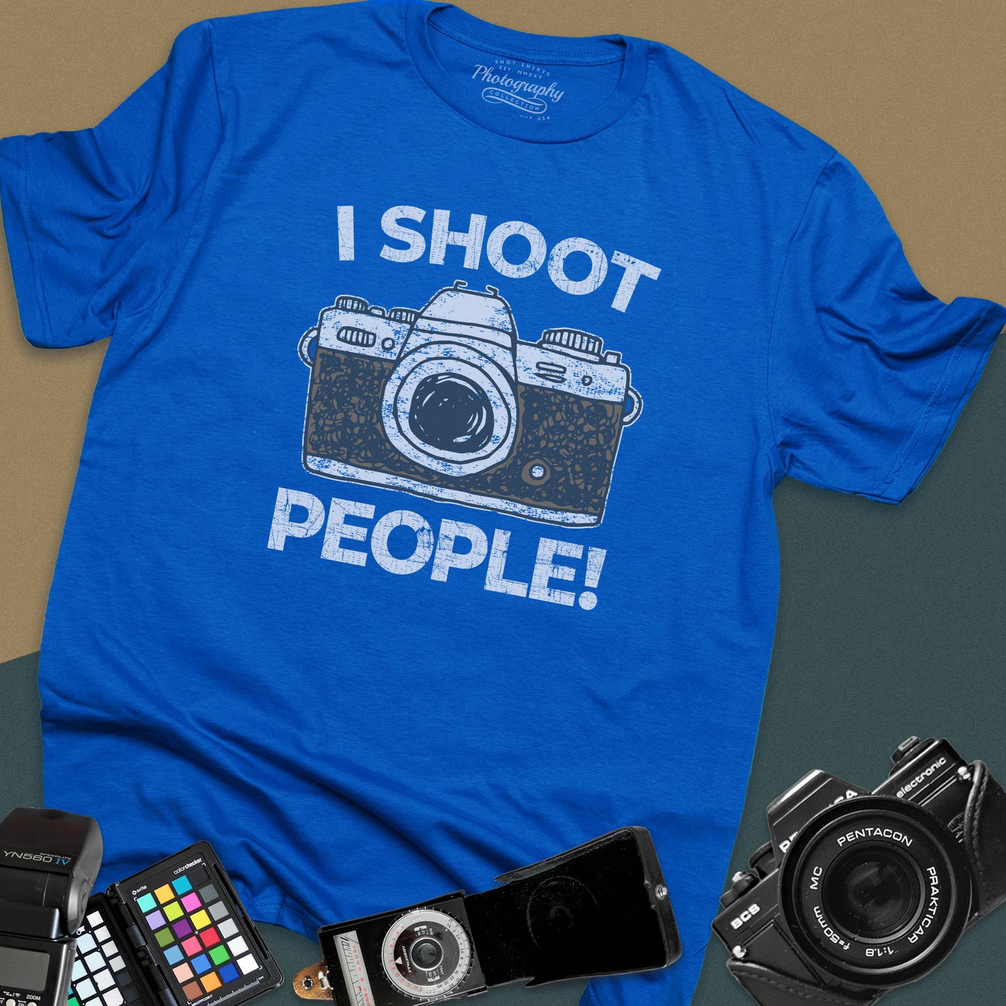 Distressed royal-blue t-shirt featuring a vintage SLR camera graphic with bold text I Shoot People for professional portrait and street photographers.
