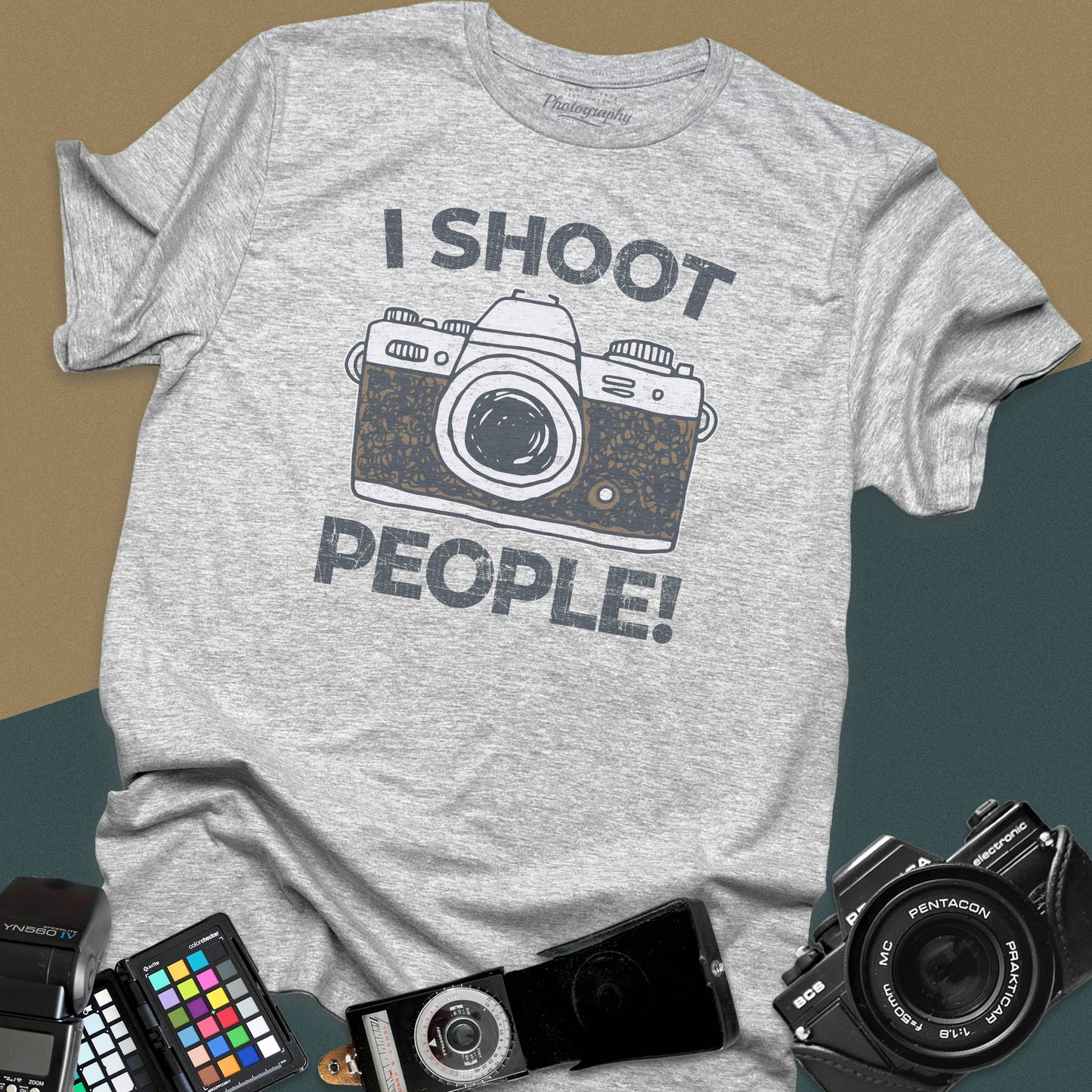 Distressed sport-grey t-shirt featuring a vintage SLR camera graphic with bold text I Shoot People for professional portrait and street photographers.