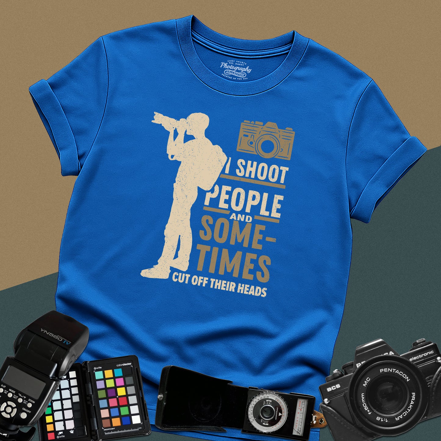 Graphic royal blue t-shirt featuring a full-body silhouette of a photographer with a backpack and telephoto lens next to the text "I shoot people".