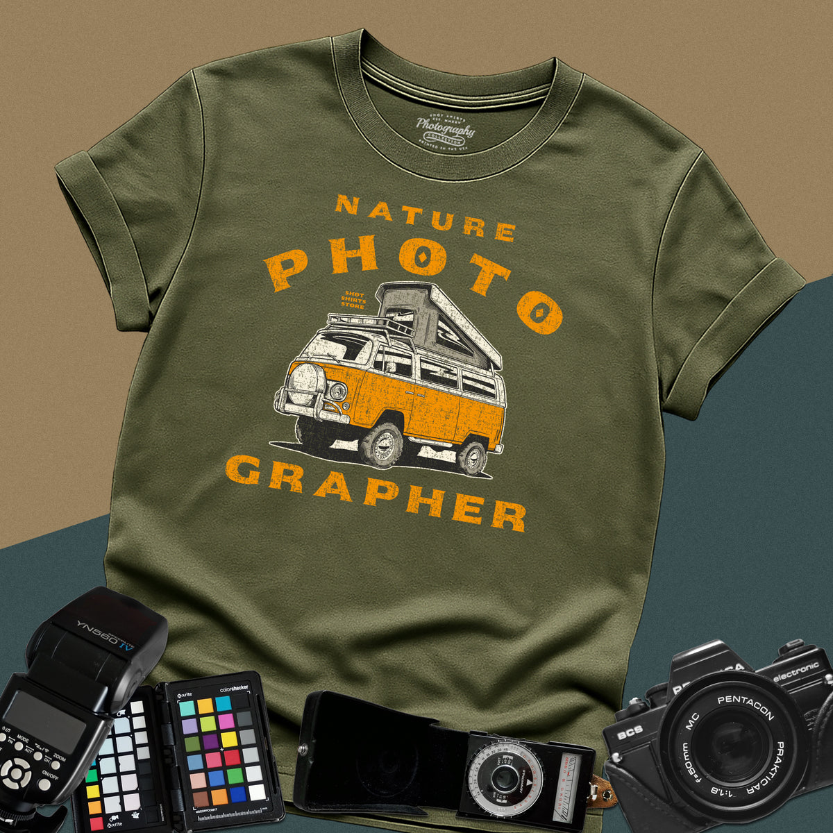 Vintage military-green t-shirt featuring a distressed orange camper van with nature photographer typography for outdoor landscape photography lovers.