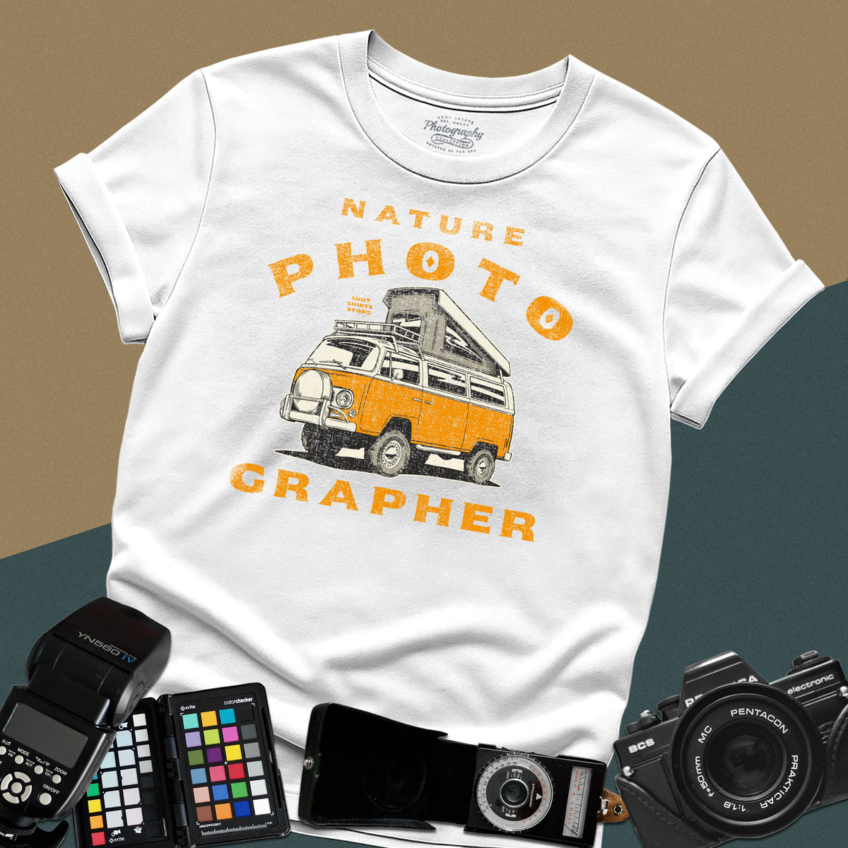Vintage white t-shirt featuring a distressed orange camper van with nature photographer typography for outdoor landscape photography lovers.