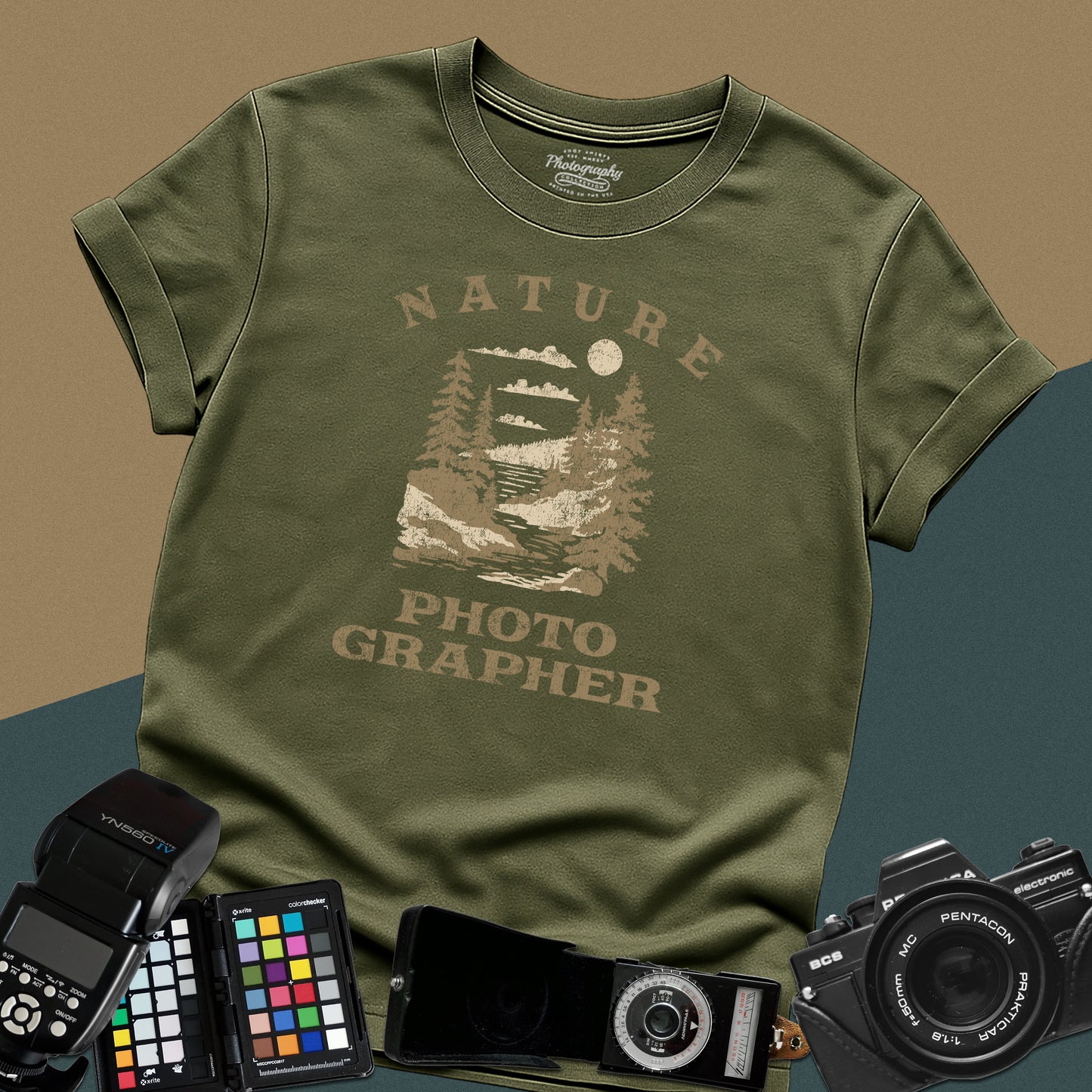 Vintage military-green graphic t-shirt featuring a mountain lake landscape with pine trees and the text "Nature Photographer" for landscape shooters.
