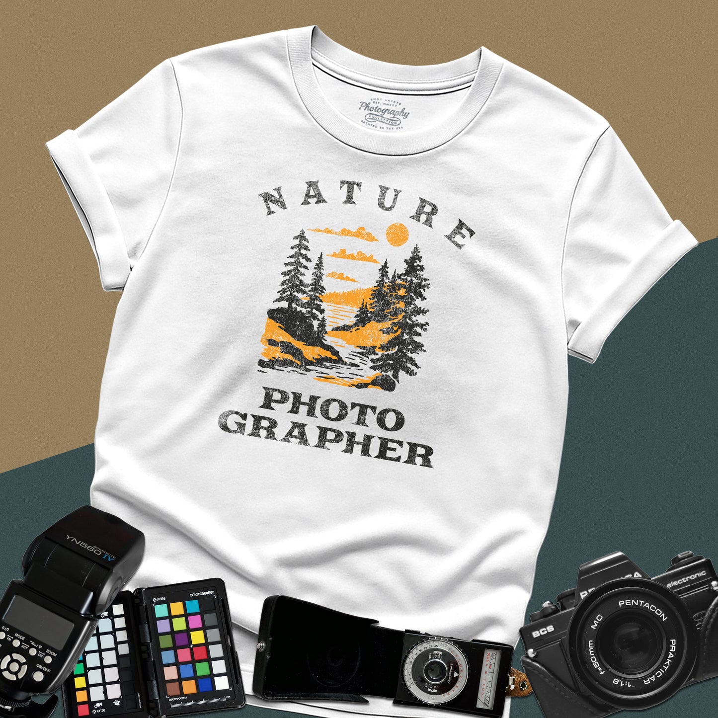 Vintage white graphic t-shirt featuring a mountain lake landscape with pine trees and the text "Nature Photographer" for landscape shooters.