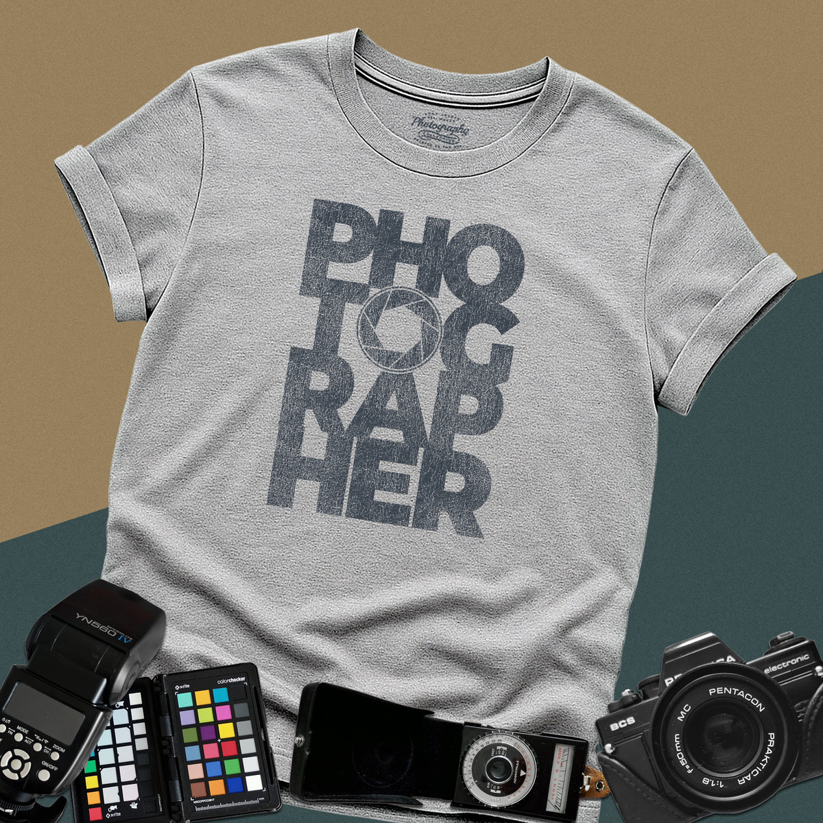 Clean sport-grey t-shirt featuring a geometric bold block typography design spelling photographer with a camera aperture lens icon inside the letter O.