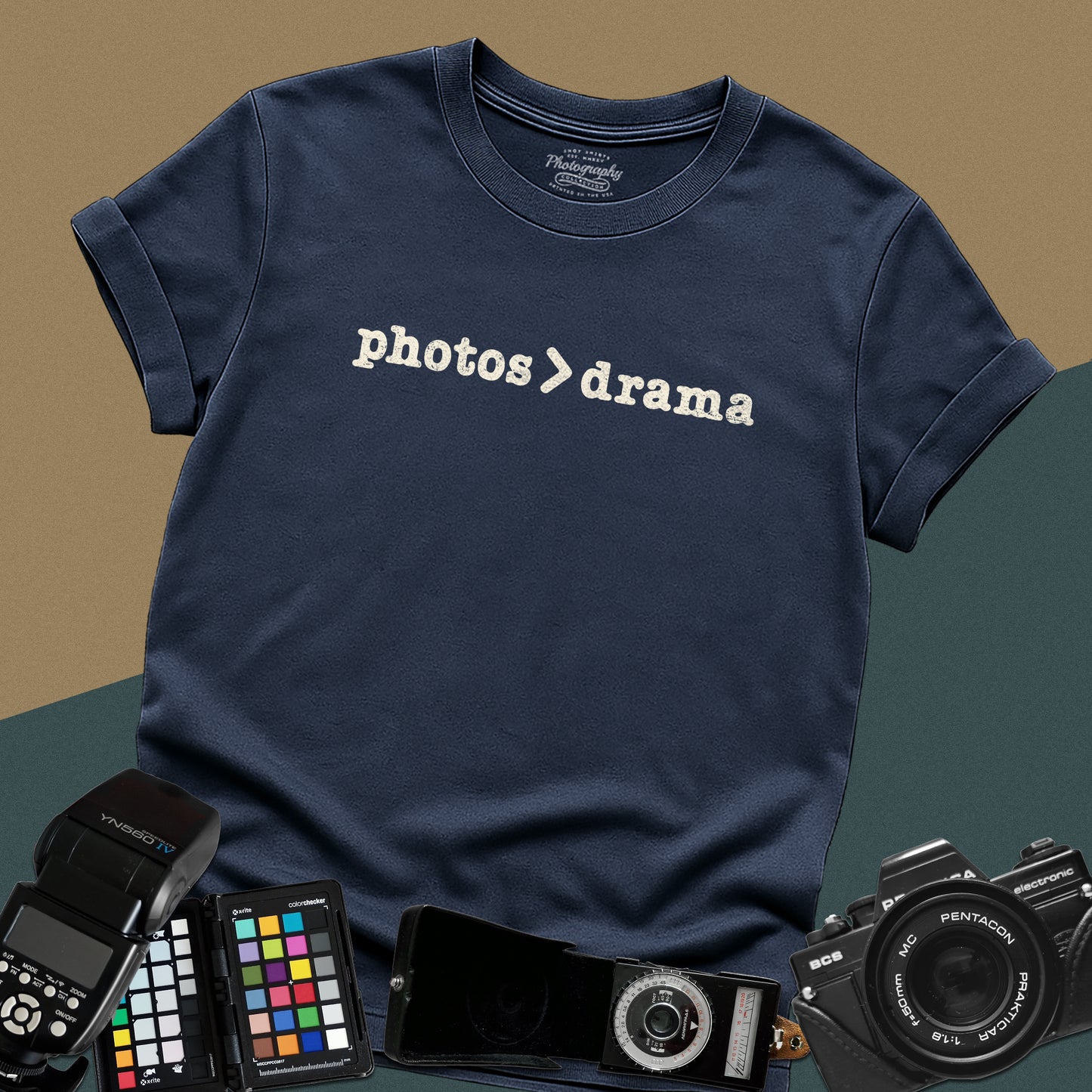 Minimalist navy blue t-shirt featuring the graphic text "photos > drama" for professional studio and wedding photographers.