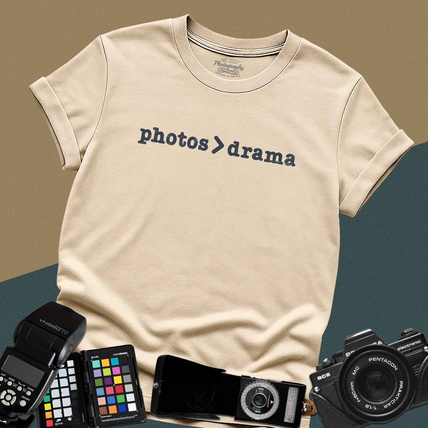 Minimalist sand t-shirt featuring the graphic text "photos > drama" for professional studio and wedding photographers.