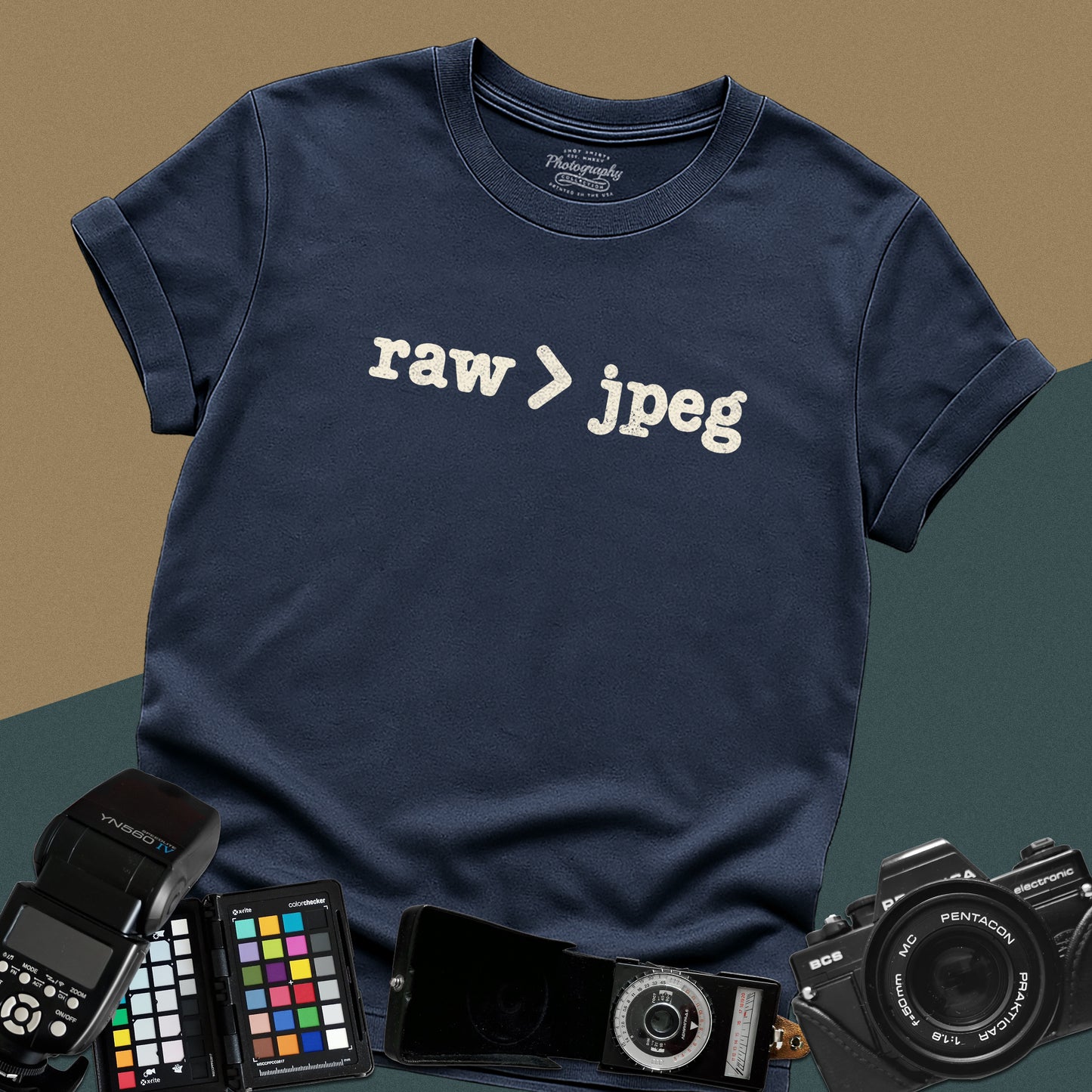 Minimalist navy blue t-shirt featuring the white text "raw > jpeg" for professional photographers.