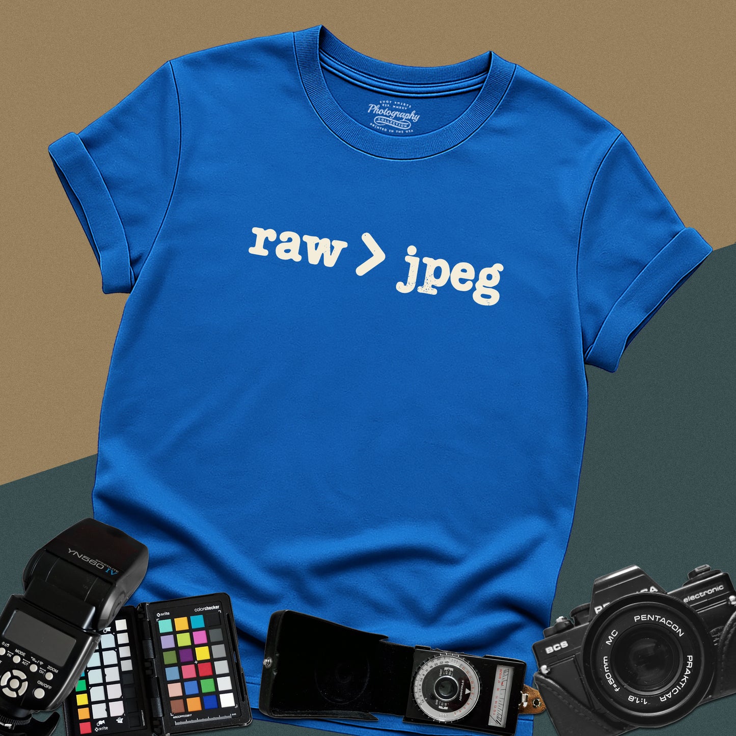 Minimalist royal blue t-shirt featuring the white text "raw > jpeg" for professional photographers.
