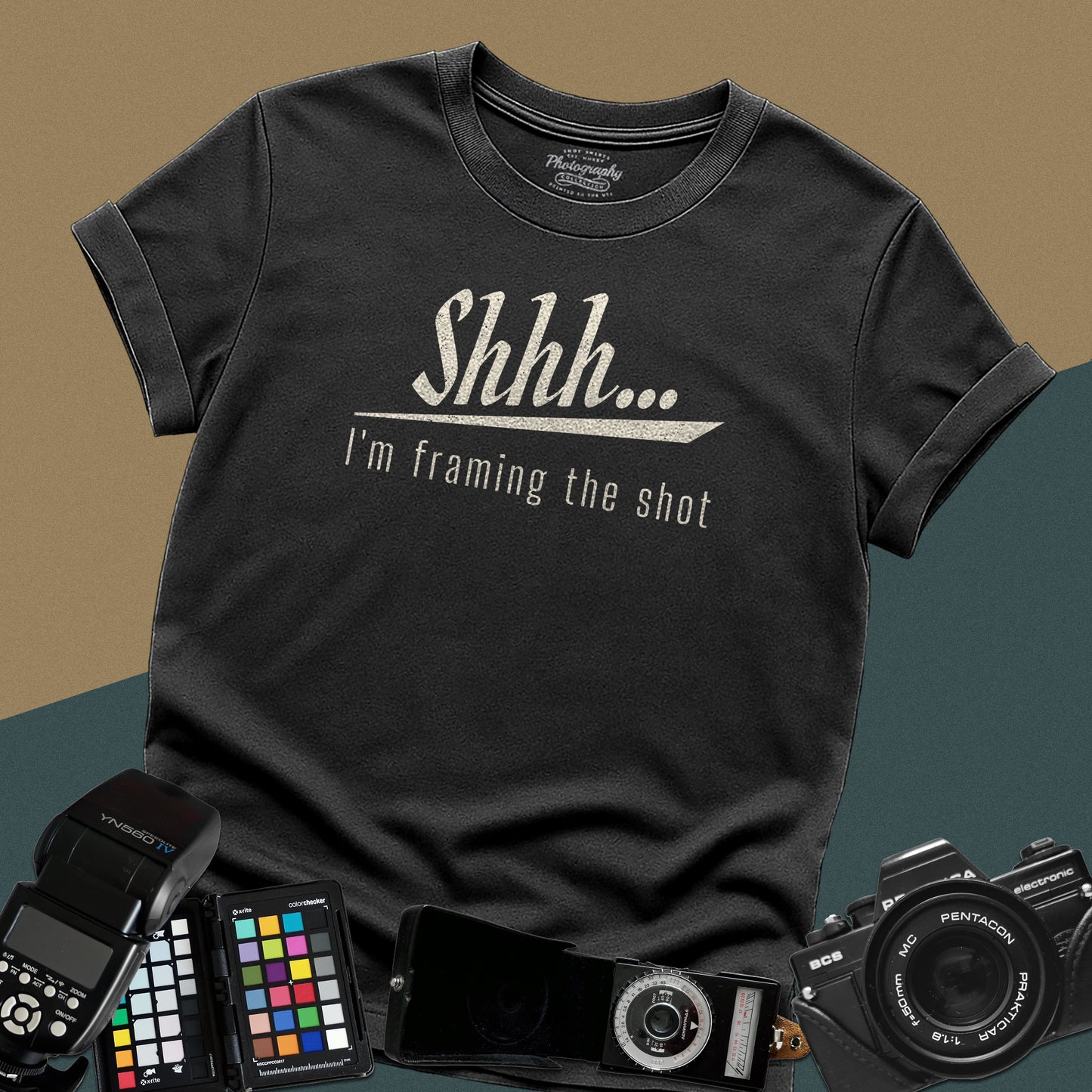 Minimalist black t-shirt featuring the distressed vintage text "Shhh... I'm framing the shot" for professional portrait photographers.
