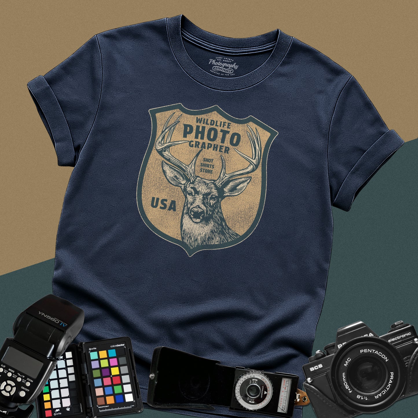 Vintage navy-blue graphic t-shirt featuring a retro emblem with a deer and the text "Wildlife Photographer USA" for nature shooters.
