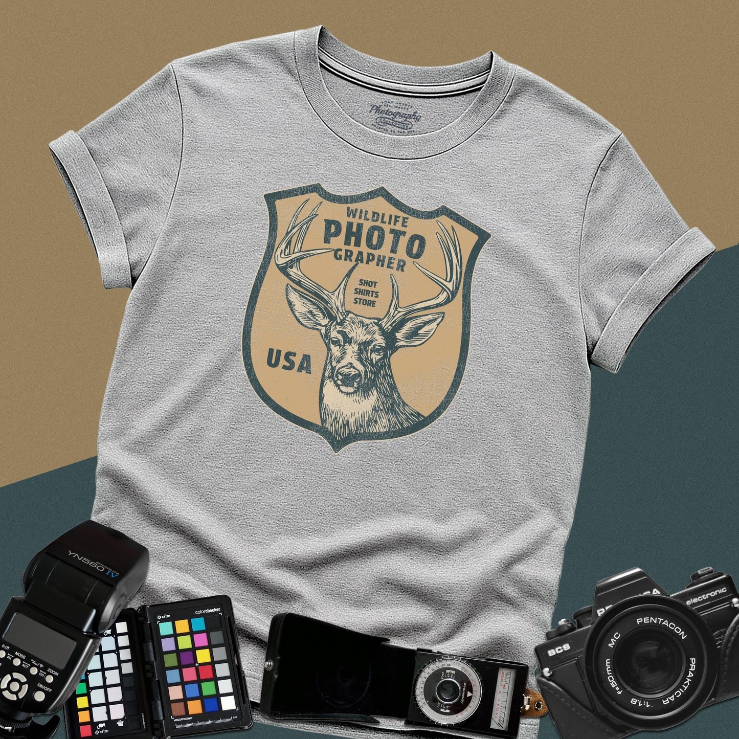 Vintage sport-grey graphic t-shirt featuring a retro emblem with a deer and the text "Wildlife Photographer USA" for nature shooters.